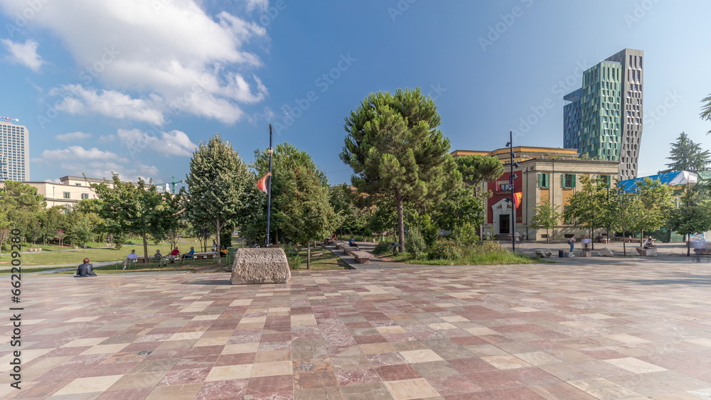 Fototapeta premium Panorama showing the Skanderbeg memorial and Ethem Bey mosque on the main square in Tirana timelapse, Albania