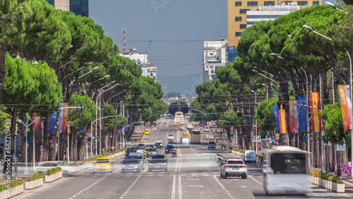 Traffic on the Deshmoret e Kombit Boulevard in Tirana timelapse. photo