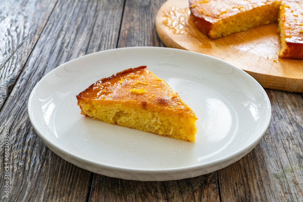Tort de lamaie - lemon cake on wooden table
Tort de lamaie - lemon cake on wooden table