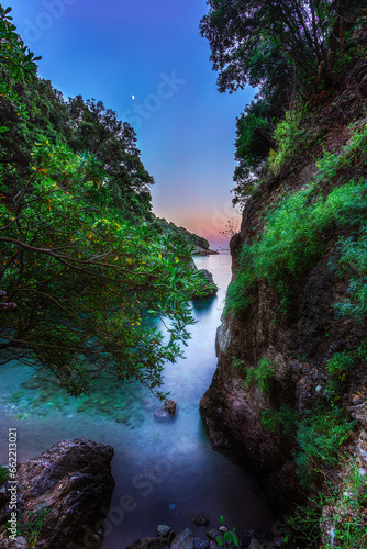 Beautiful sunset on the seashore between the rocks in La Caletta di Lerici  Liguria  Italy