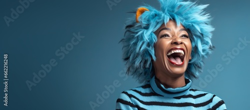 Generative AI banner of a a copy space banner of a smiling Happy Adult Black Woman Wearing a Tiger Costume for Halloween on a Blue Banner with Space for Copy