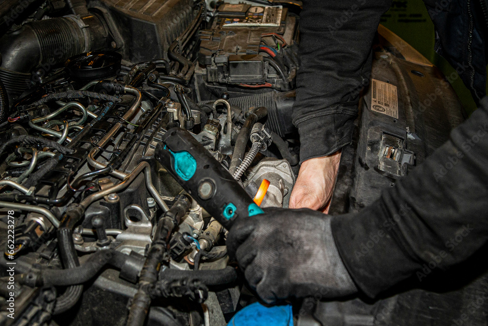 Work in a car garage Work in a car garage