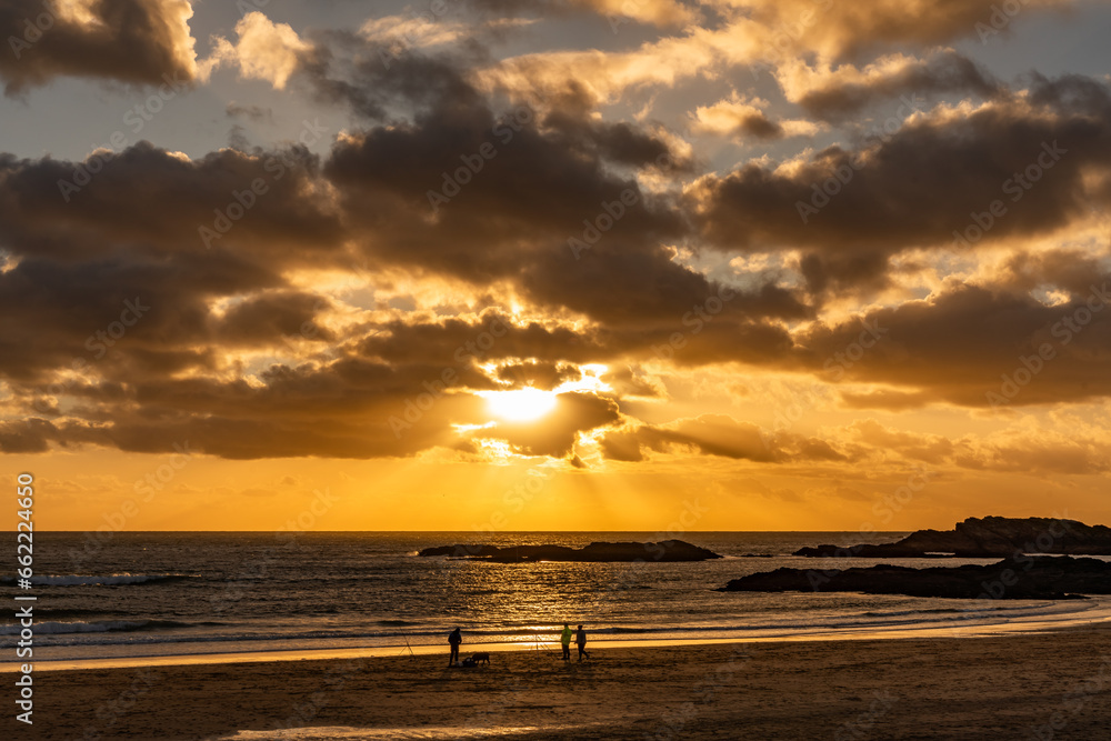 Sunset on the beach at Trearddur bay Beach, Anglesey, Wales