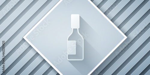 Paper cut Tabasco sauce icon isolated on grey background. Chili cayenne spicy pepper sauce. Paper art style. Vector