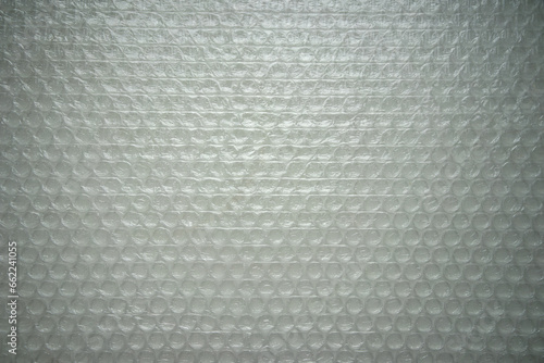 Background of bubble wrap.Soft packaging for shipping.Photo of the texture of the plastic film.