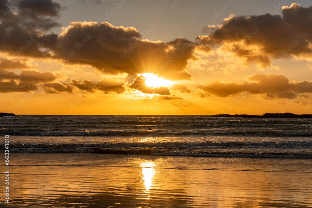 Sunset on the beach at Trearddur bay Beach, Anglesey, Wales