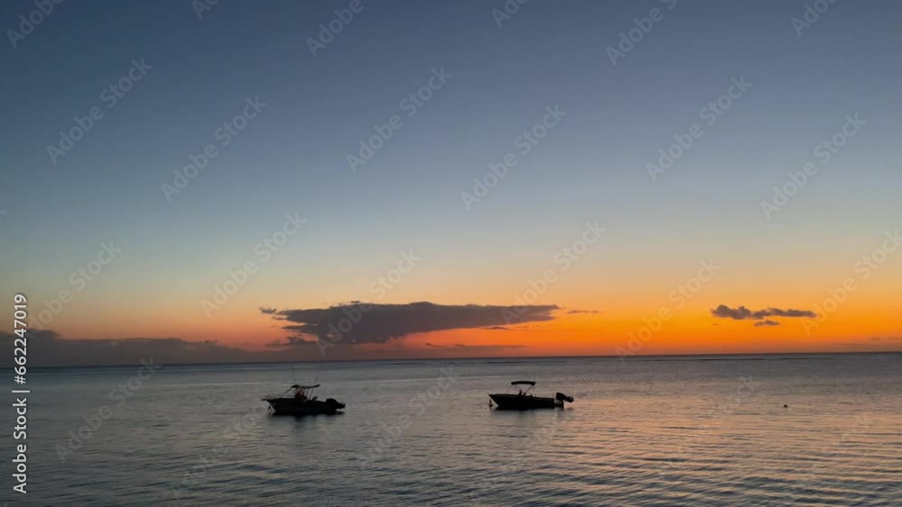 Colorful and cloudy sky after sunset over Indian Ocean Colorful and cloudy sky after sunset over Indian Ocean