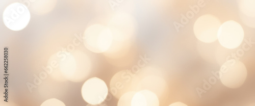 A brilliant blurry white gold background for a festive mood. Template for greeting card for entertainment.
