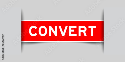 Red color square label sticker with word convert that inserted in gray background