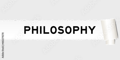 Ripped gray paper background that have word philosophy under torn part