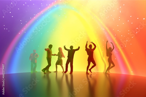 People Dancing Under Rainbow Lights