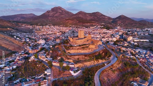 Alcaudete Castle at sunset. Aerial view from a drone. Greenways of Jaen. Province of Jaen. Andalusia. Spain. Europe photo