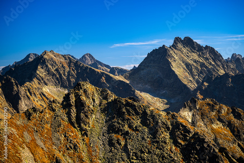 The Mount Rysy, Lomnica and Wysoka. Autumn landscape of the High Tatras. One of the most popular travel destination in Poland and Slovakia. Sunny October day in the mountains.