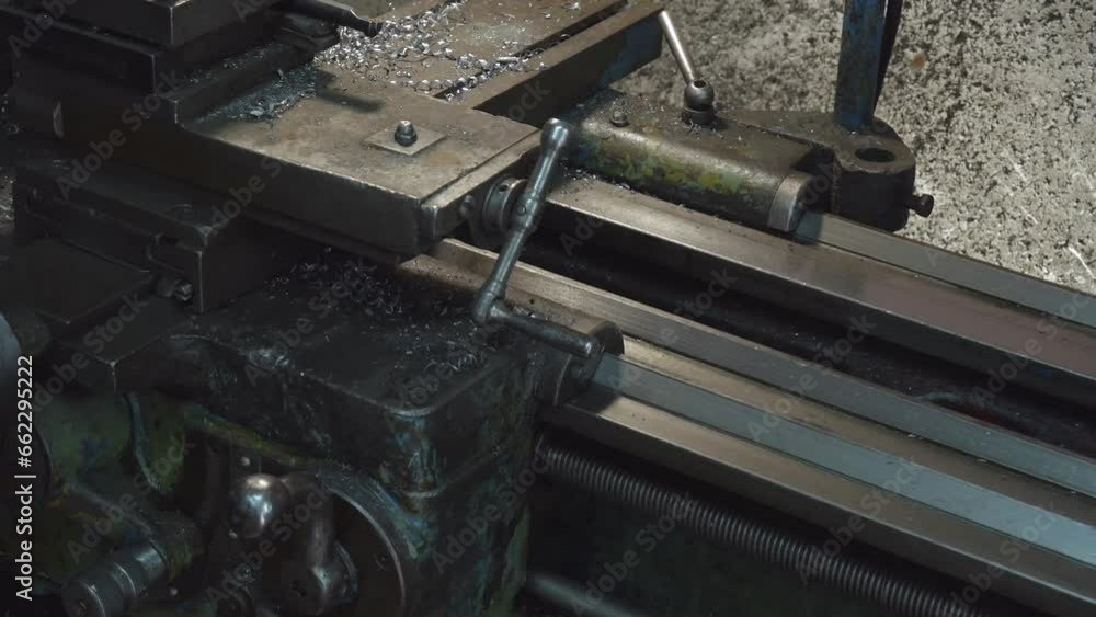A large Soviet machine for processing metal and manufacturing various metal elements. High quality 4k footage