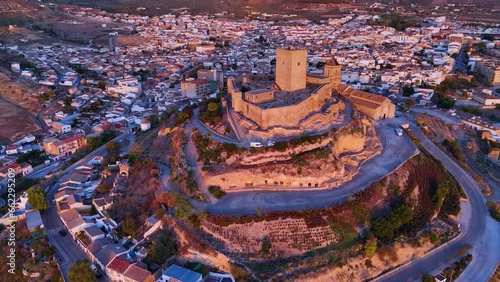 Alcaudete Castle at sunset. Aerial view from a drone. Greenways of Jaen. Province of Jaen. Andalusia. Spain. Europe photo