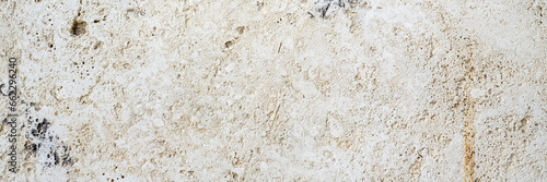 Element of old rough concrete wall as background or texture