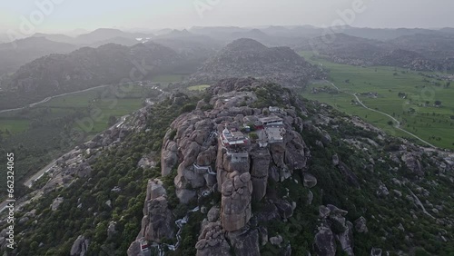 Aerial view: Hindu temple on Anjanadri Hill amidst rocky mountains and natures lap photo