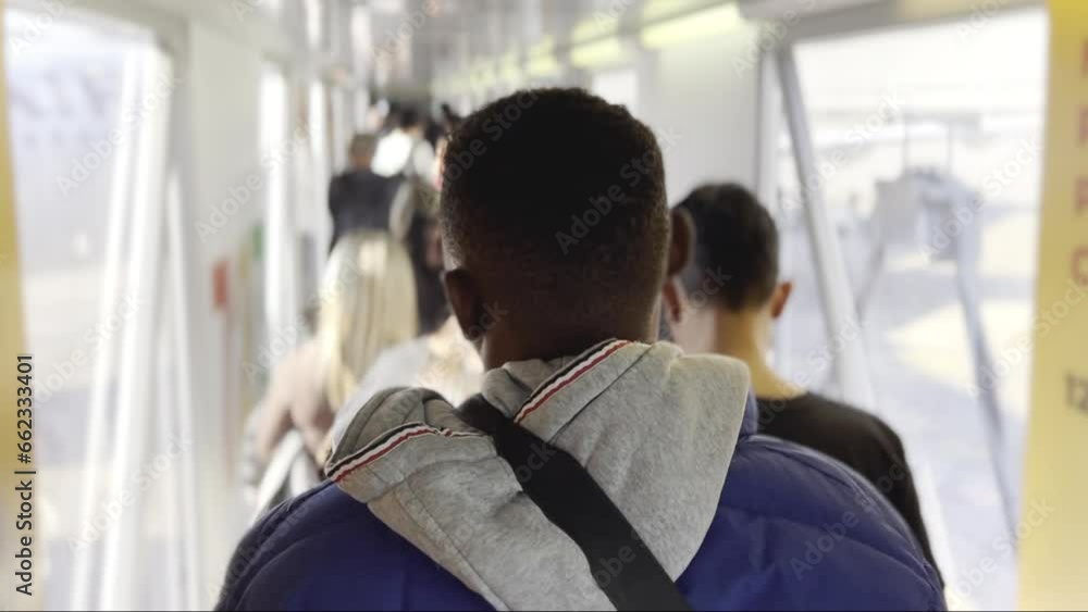 Passengers Waiting at Boarding Bridge on Airplane, Airport Terminal Platform Highlighting Tall Young Black Man Passengers Waiting at Boarding Bridge on Airplane, Airport Terminal Platform Highlighting Tall Young Black Man