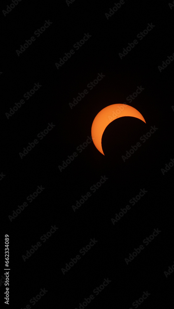 Solar eclipse. October 14th, 2023. Moon and sun Solar eclipse. October 14th, 2023. Moon and sun