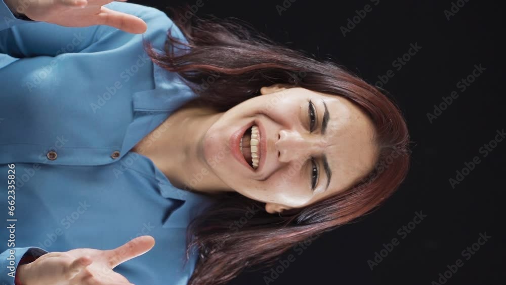 Vertical Video of Woman shouting at camera close-up. Vertical Video of Woman shouting at camera close-up.