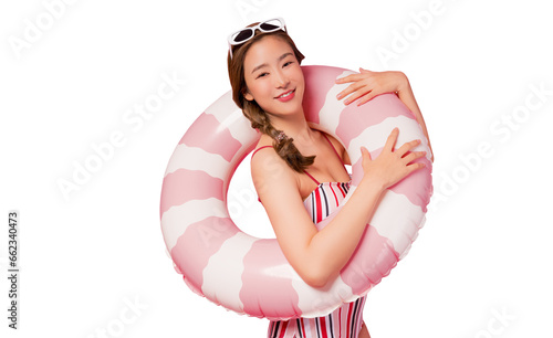 Summer holiday happy young asian woman portrait Happy young woman wear swimsuit hold pink swim ring or inflatable tube ring Lady smile and loook at camera isolated on pink color background studio shot photo