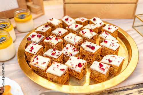 carrot cakes as dessert on a banquet table at a party