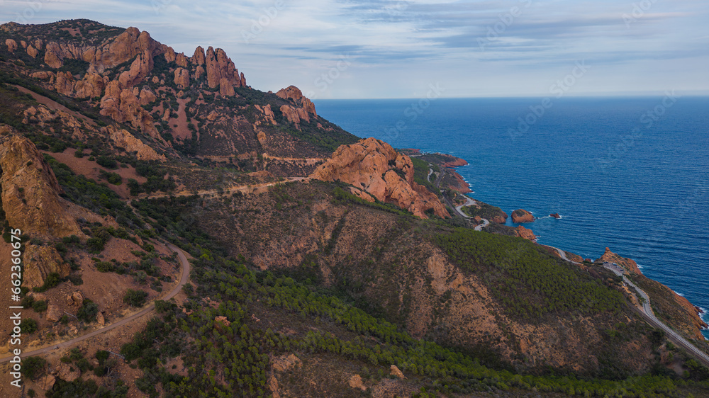 Aerial view of the Massif de L'Esterel and red cliffs falling into the Mediterranean Sea. French Riviera. Cote d'Azur - France