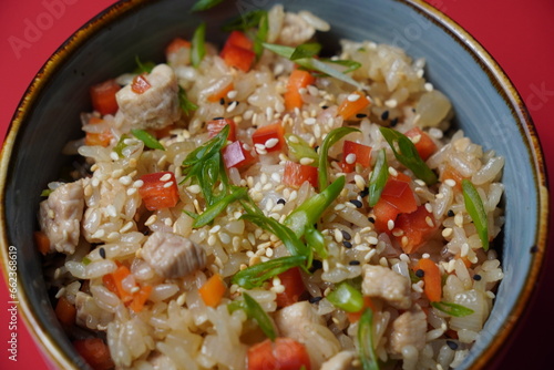 rice with herbs and chicken, wok, asian food