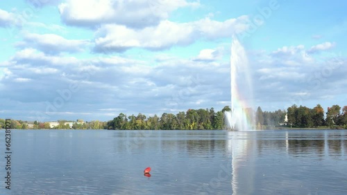 Peterborough landmark centennial Fountain with rainbow in Little Lake, Peterborough, Ontario, Canada photo