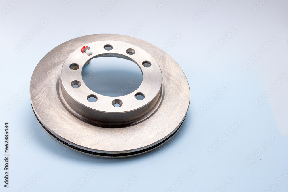 Details and components of the hydraulic clutch system of cars for repair and maintenance work on a white background, close-up. Details and components of the hydraulic clutch system of cars for repair and maintenance work on a white background, close-up.