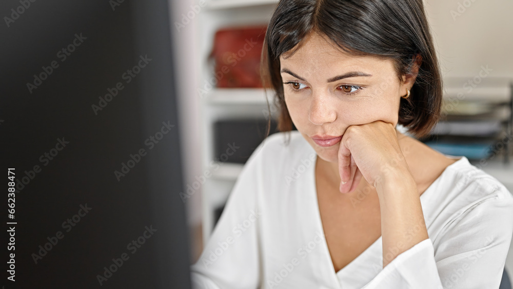 Young beautiful hispanic woman business worker using computer working at office Young beautiful hispanic woman business worker using computer working at office