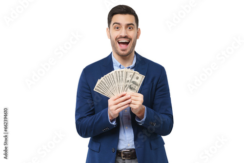Young man holding fan of dollars in both hands, screaming with joy, winning money in lottery, feeling excited