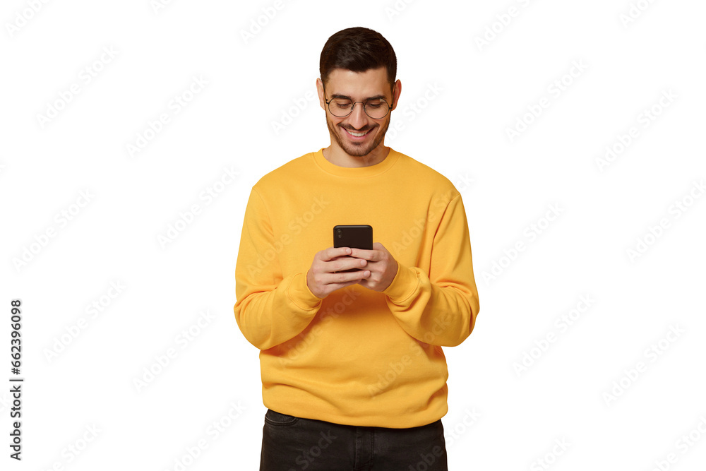 Young handsome man looking at phone screen, using social media app Young handsome man looking at phone screen, using social media app
