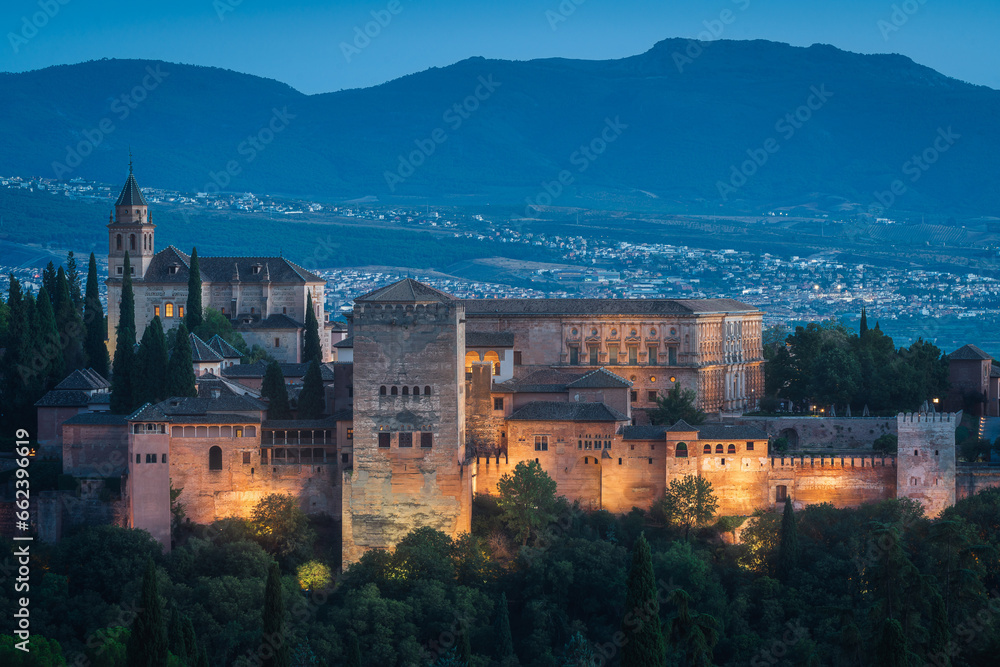 Panoramic view of the Alhambra at dusk in Granada, Spain