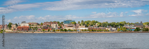 cityscape panorama of Alton in Illinois on a shore of the Mississippi River, a view from the Missouri shore photo