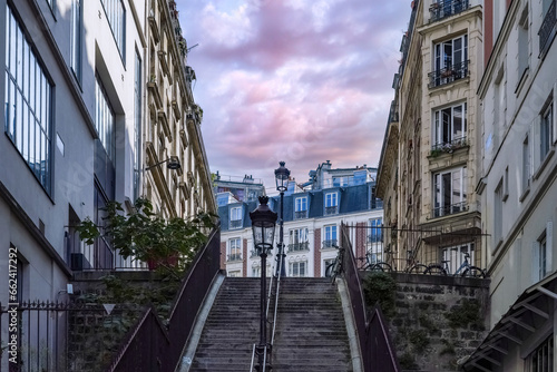 Paris, romantic staircase in Montmartre, typical buildings and floor lamp 