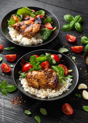 Baked balsamic chicken thighs with rice and vegetables
