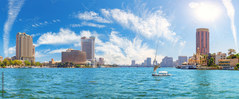 The Nile river view with boats and luxury hotels in the downtown of Cairo, Egypt