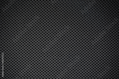 Close up of a mesh fabric, showcasing its texture.