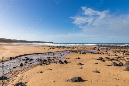 Beach with Sand and Small Rocks at Mon Repos Walking Track near Bundaberg, Queensland, Australia.