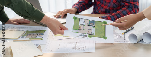 Quadro su tela Professional architect engineer team discussion about green design of eco house at green business team meeting