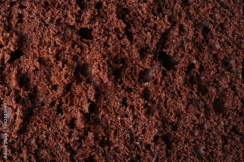 Tasty chocolate sponge cake as background, closeup - obrazy, fototapety, plakaty 