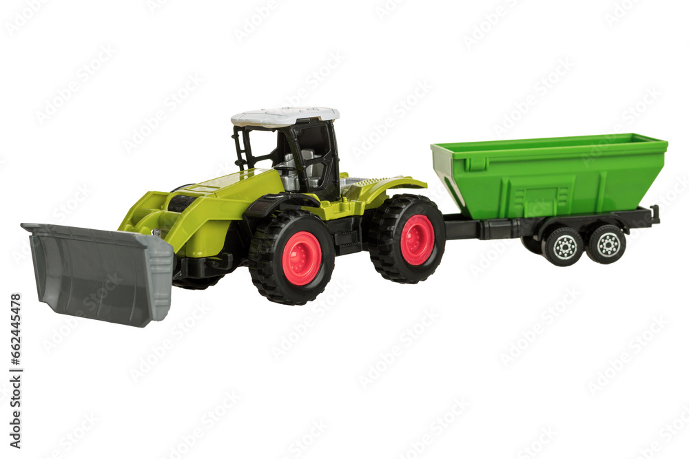 Obraz premium Toy farm tractor with cart, plastic children's play, isolated on white background