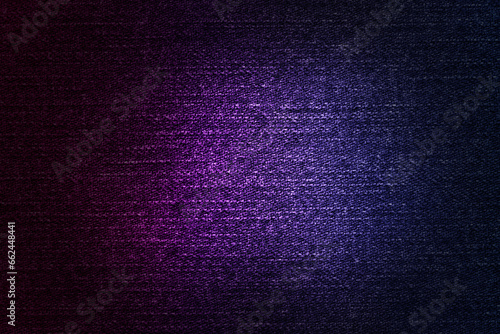 Empty jeans fabric background with neon light illuminated