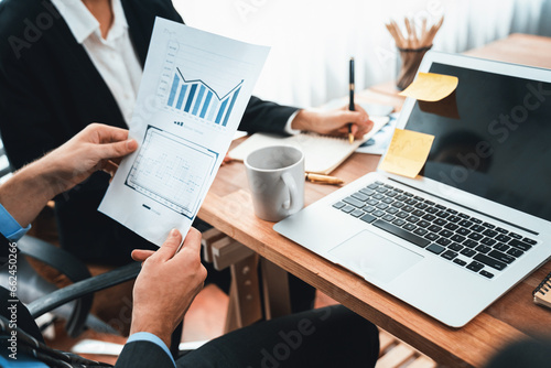 Financial data analysis dashboard by Fintech BI or business intelligence display on laptop screen to in-depth financial data analysis by business people working on business marketing. Habiliment © Summit Art Creations