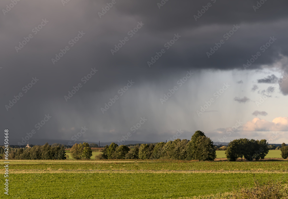 landscape in autumn, dark clouds and golden sun over agrultural fields near Göttingen, Reinhäuser Landstraße, Germany
landscape in autumn, dark clouds and golden sun over agrultural fields near Göttingen, Reinhäuser Landstraße, Germany