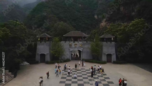 Aerial shot drone flies up and away from Baili gate in Yesanpo Nature Reserve photo