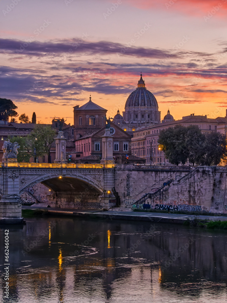 Rome sunset over Tiber and St. Peter's Basilica Vatican, Italy