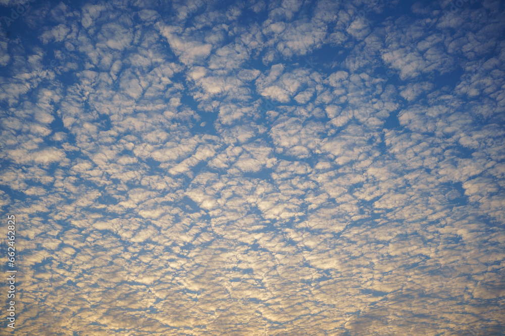 Morning Bliss: Little Altocumulus Clouds in the Blue Sky