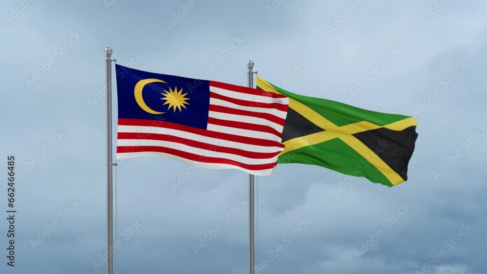 Jamaica and Malaysia flag waving together on cloudy sky, endless seamless loop, two country cooperation concept Jamaica and Malaysia flag waving together on cloudy sky, endless seamless loop, two country cooperation concept